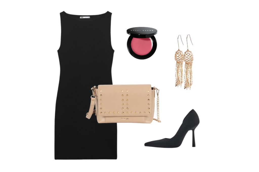Look total black con bolso de mano Temis de Binnari.