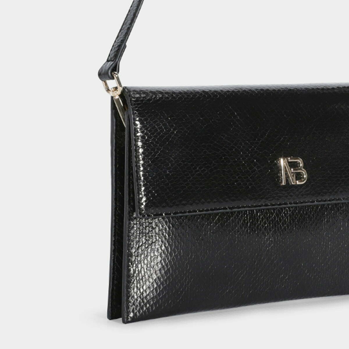 bolso-mano-lagos-19582-negro-binnari-d 1