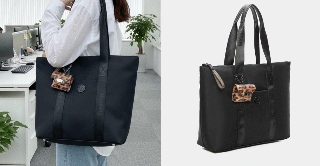 Bolso tote negro con asas largas y llavero de estampado animal, mostrado en una oficina y en vista de producto sobre fondo claro.